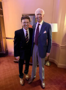 David Pratt Hunt, Deputy Director of the Central Intelligence Agency and treasured friend, alongside Derek Bryson Park at the Pratt Lounge during a prestigious gathering