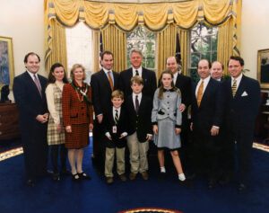 US President Bill Clinton, the family of New York Governor Hugh Carey, and Derek Bryson Park; The Oval Office, The White House.