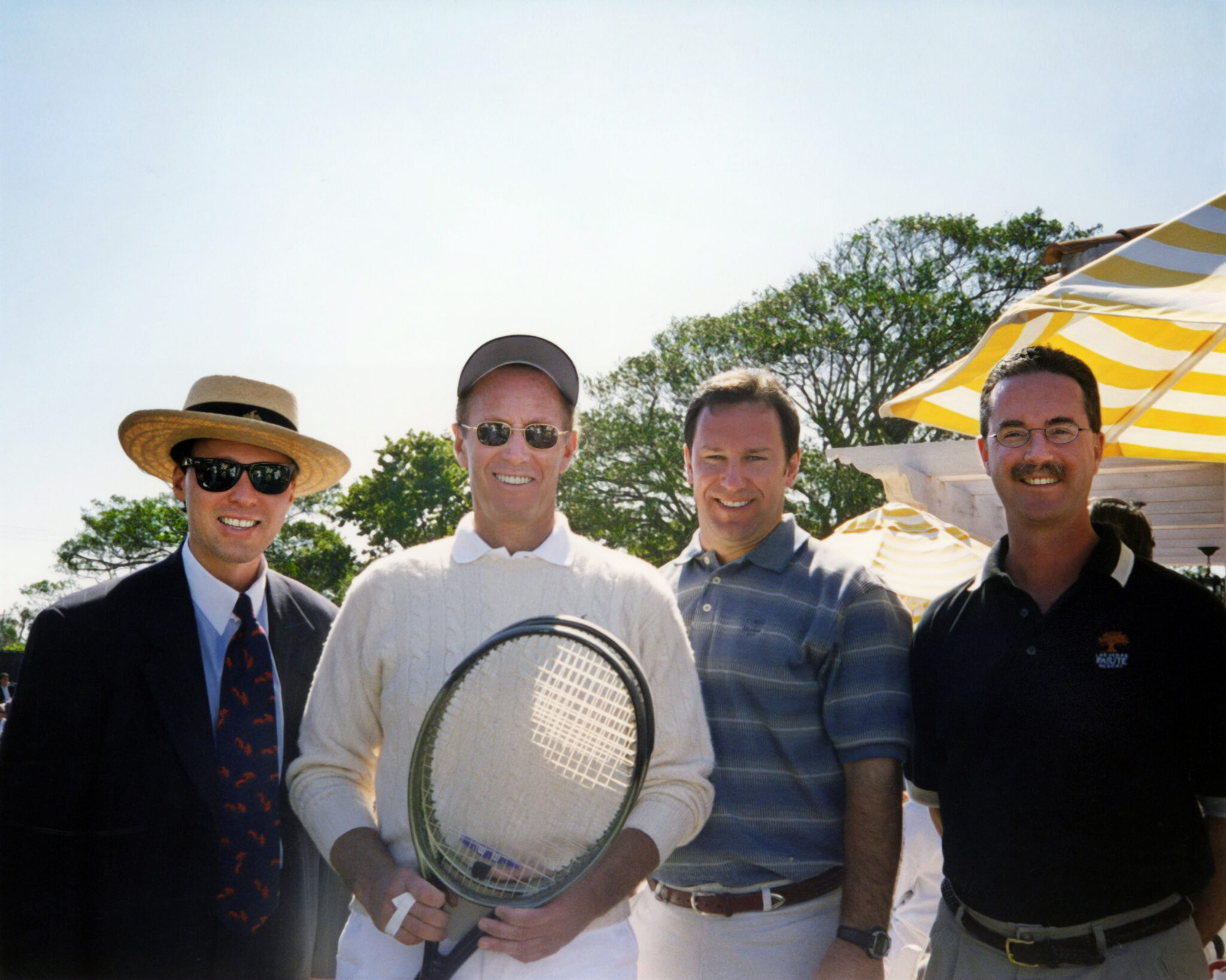 Managing Director, Lehman Brothers, Derek Bryson Park; Chairman of Cendant Corporation, Henry R. Silverman; CEO and President of the Title Resource Group of Coldwell Banker, Donald J. Casey; and President of GMAC Bank, Robert Groody at Donald Trump’s Estate Mar-a-Largo, Palm Beach, Florida.