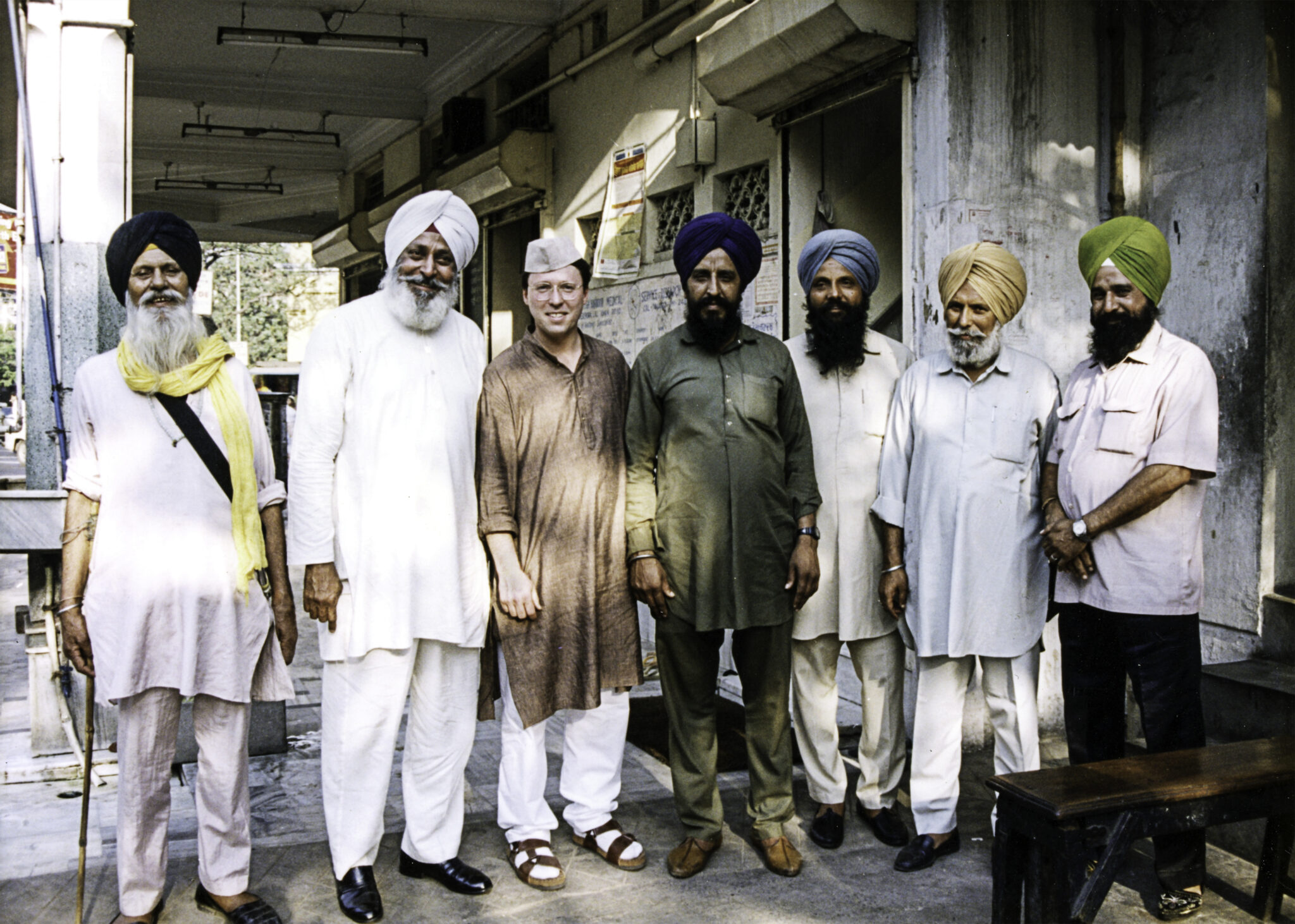 Derek Bryson Park and the Granthi (Priest) and members of the congregation of a Sikh temple, Kolkata (formerly Calcutta), India