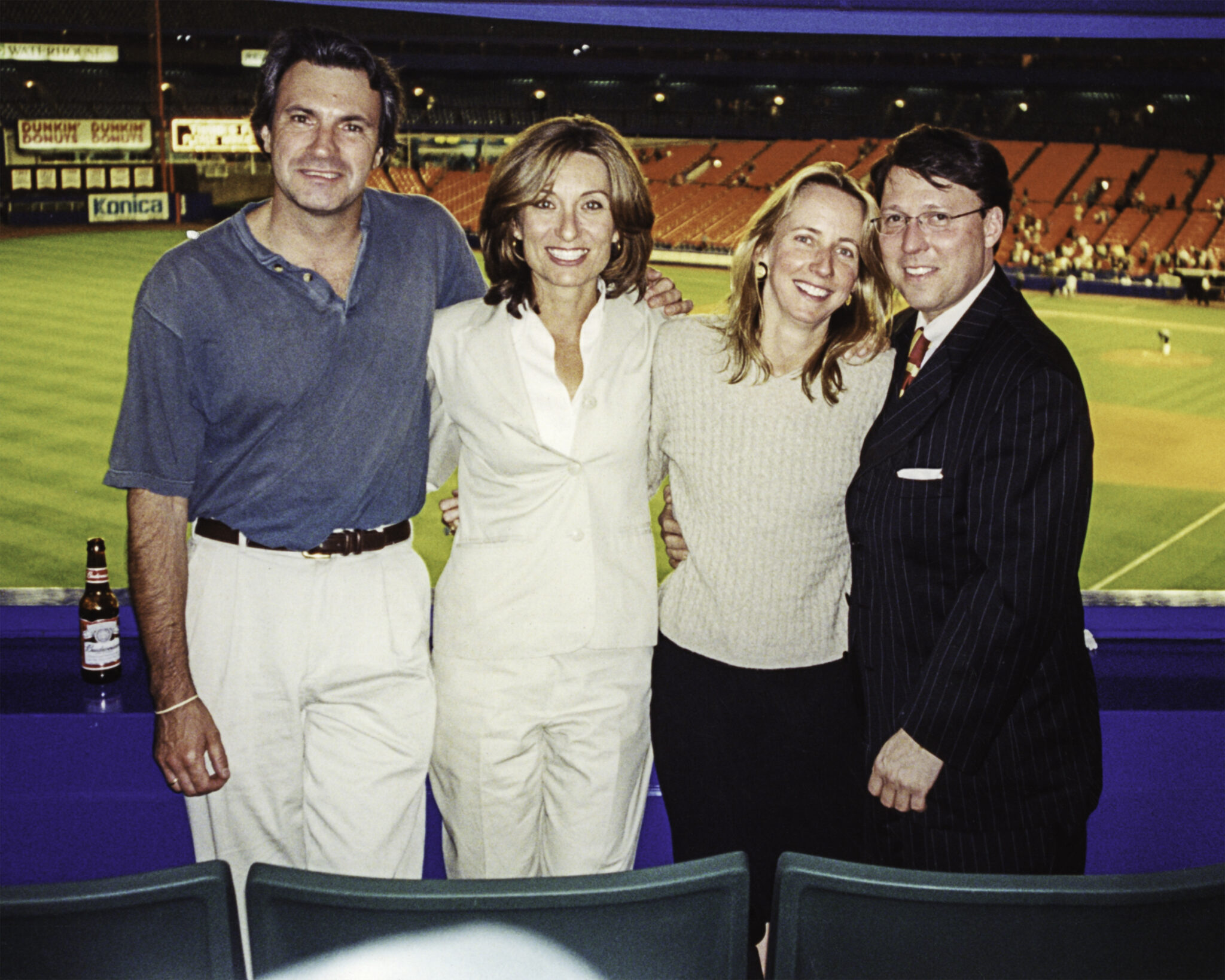 [Left to Right] Rudy Giuliani (cousin of the former NYC Mayor); Catherine Giuliani; Derek Bryson Park and friend, Yankee Stadium, NYC