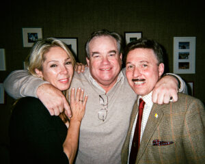 Pictured in <a href="https://en.wikipedia.org/wiki/Greenwich,_Connecticut" target="_blank">Greenwich, Connecticut</a>, are (from left) George Skakel III, his wife Alisa Skakel, and Derek Bryson Park. An heir to the <a href="https://en.wikipedia.org/wiki/Great_Lakes_Carbon_Corporation" target="_blank">Great Lakes Carbon</a> fortune and Managing Director of Paragon Capital LP, the younger Skakel represents a prominent American dynasty whose influence has bridged the worlds of private industry and political power. His lineage is notably linked to the <a href="https://en.wikipedia.org/wiki/Kennedy_family" target="_blank">Kennedy family</a> through his aunt, <a href="https://en.wikipedia.org/wiki/Ethel_Kennedy" target="_blank">Ethel Skakel Kennedy</a>, the widow of former <a href="https://en.wikipedia.org/wiki/United_States_Attorney_General" target="_blank">United States Attorney General</a> and presidential candidate <a href="https://en.wikipedia.org/wiki/Robert_F._Kennedy" target="_blank">Robert F. Kennedy</a>.