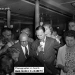 Dr. Lewis Charles Park, M.D, the man in the center wearing a bow tie, on board the RMS “QUEEN ELIZABETH